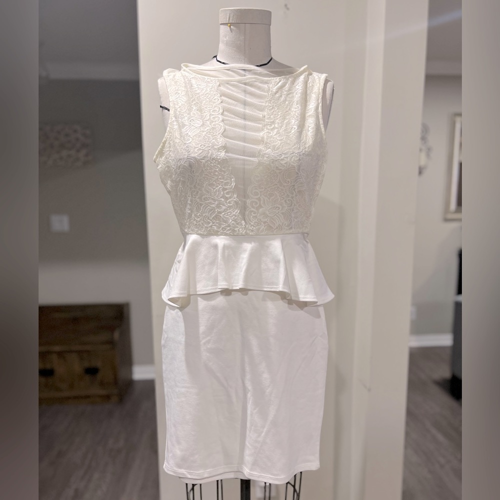 Transparent top peplum mini dress.